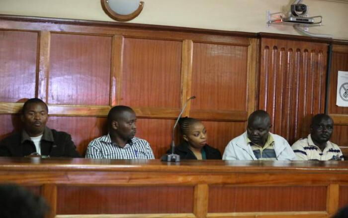 From left, police informer Peter Ngugi, Leonard Mwangi, Sylivia Wanjiku, Stephen Cheburet Morogo and Fredrick Leliman in a Milimani court during a past hearing.