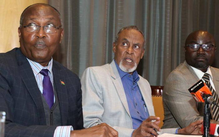 Building Bridges Initiative chairman Yusuf Haji (centre), Vice-Chair Adams Oloo (right) and the task force secretary Paul Mwangi (left) address the media in Nairobi on July 15, 2019.