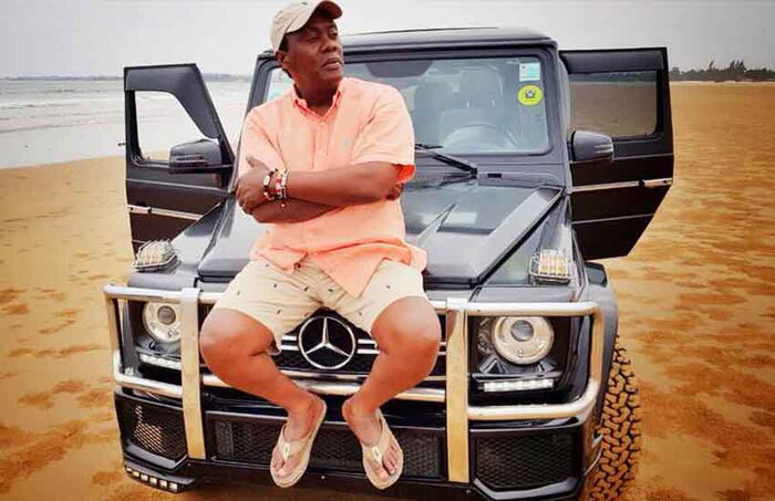 Jeff Koinange seats atop his Mercedes Benz valued at Ksh10 million.