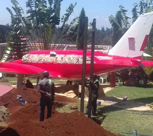 Image of workers carrying out paintwork on Jaguar's plane. The plane is currently undergoing paint work to give it a fresh new look