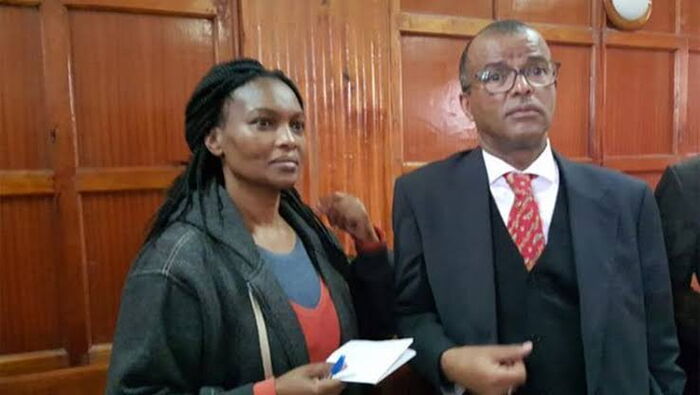 Lawyer Phillip Murgor with client, Sarah Wairimu in a court in Nairobi. Murgor's appointment to the role of pubic prosecutor was earlier questioned for his decision to defend Wairimu. She was a key suspect in the murder of tycoon, Tob Cohen.