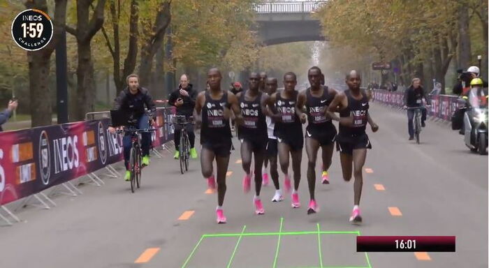 Eliud Kipchoge (white) running in Vienna, Austria in the INEOS challenge