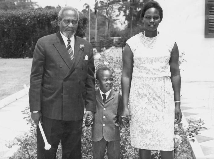 President Uhuru Kenyatta being held by his parents Mzee Jomo Kenyatta and Mama Ngina.