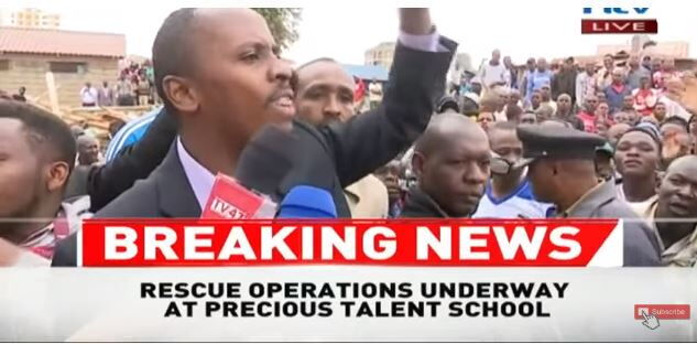Dagoretti Member of Parliament John Kiarie addressing jeering residents in the scene of the collapsed story.