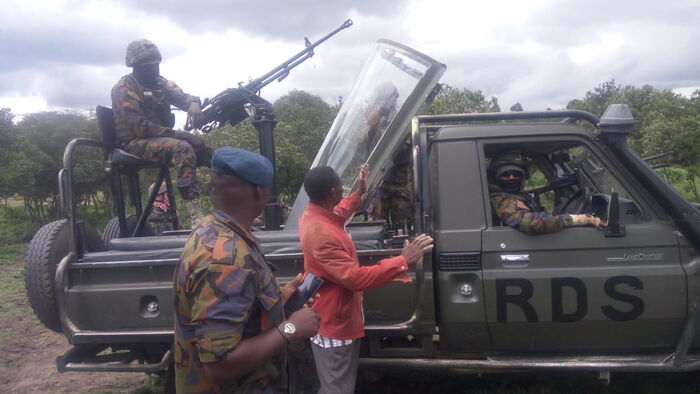 Kenya Air Force officials after they retrieved a cockpit fighter jet canopy that fell from the skies. December 9, 2016.