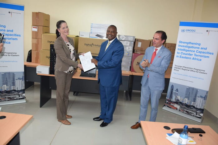 DCI George Kinoti receiving equipment from the German ambassador.