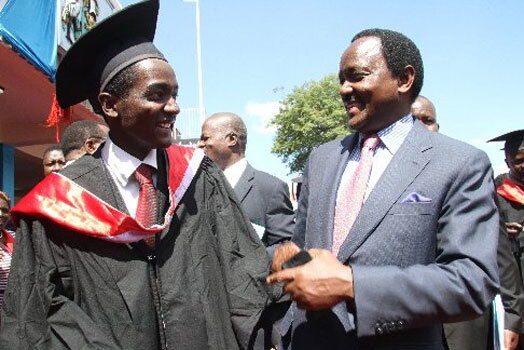 Klein Kalonzo with his father, Kalonzo Musyoka during his graduation at the University of Nairobi in 2014.