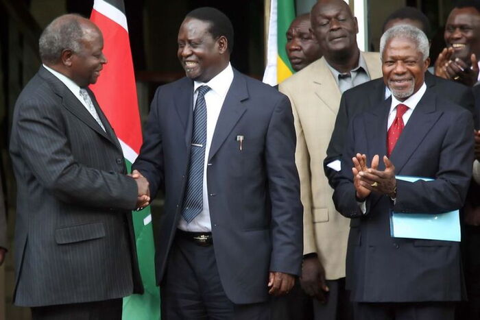 Warring leaders Raila Odinga and Mwai Kibaki and lead negotiator Koffi Annan after the signing of the Gran