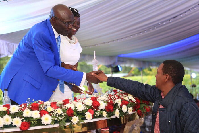 Machakos Governor Alfred Mutua congratulates Fred Machoka and his wife Sophie for the 40 years of marriage, December 7, 2019.