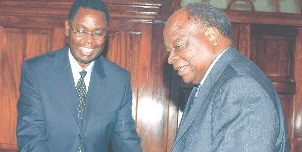Chairman of the Goldenberg Commission Justice Samuel Bosire hands over the findings to President Mwai Kibaki in March 2009
