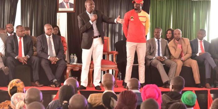 DP William Ruto with McDonald Mariga at his Karen office on Tuesday, October 8. Ruto promised to transform Kibra