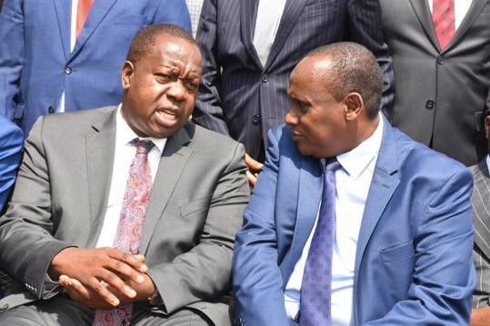 Interior CS Fred Matiang'i with the head of Public Service Joseph Kinyua at the start of the induction training for the new CASs in Nairobi on Wednesday, January 22.