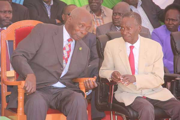 Retired President Daniel Moi (left) and former Keiyo South MP Nicholas Biwott during the opening of Trans National Bank, Iten branch, in Elgeyo-Marakwet County on January 23, 2015