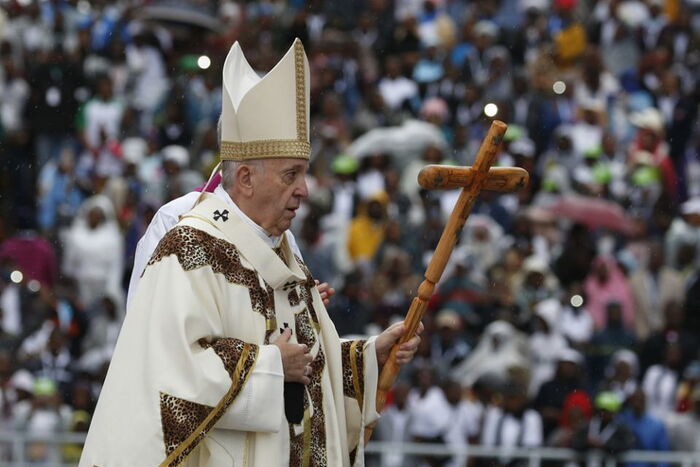 Pope Francis walks in the entrance procession as he celebrates Mass in Zimpeto Stadium Sept 6 outside Maputo, Mozambique.