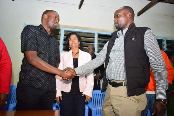 ODM Party Secretary-General Edwin Sifuna shakes hands with Bernard 'Imran' Okoth. The party has welcomed any complaints against the Imran's win