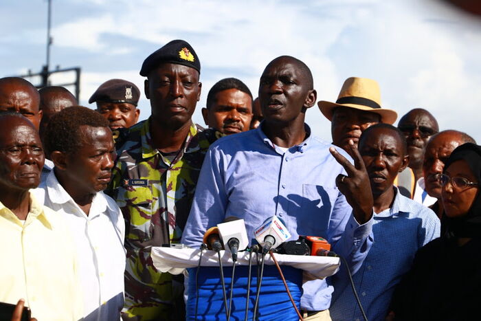 Government Spokesperson Cyrus Oguna. Kenyans online attacked him after he credited the Kenya Navy divers with the discovery of what might be the vehicle that tumbled from the ferry and sank into the ocean on September 29.