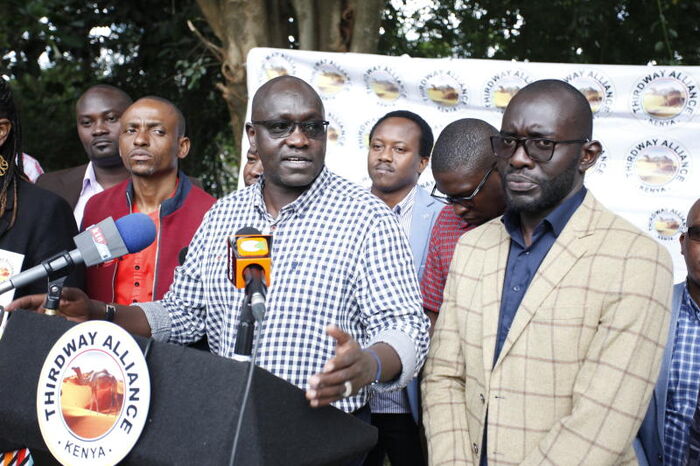 Thirdway Alliance leader Ekuru Aukot (Centre) with secretary-general Frederick Okango (Right) at a past press conference.
