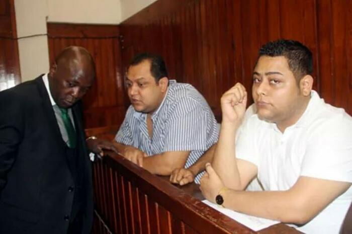 Akasha brothers with their lawyer Chris Ombetta in court. The lawyer on Tuesday, October 22, blasted the Americans over their hypocrisy in matters judicial