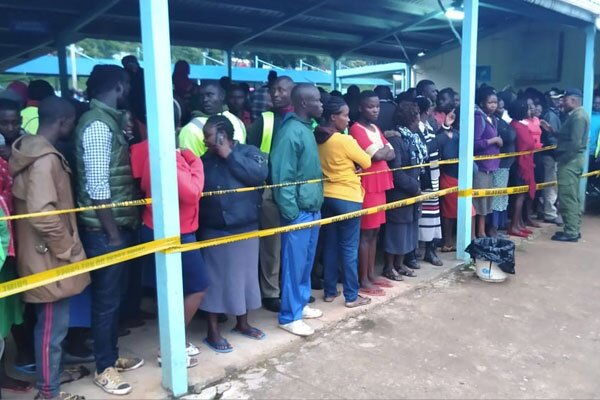 Parents wait for reports on their children at the Accidents and Emergency Unit of the Kakamega County Referral Hospital, following a stampede at Kakamega Primary School on February 3, 2020.