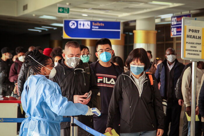 Passengers arriving at Jomo Kenyatta International Airport get scanned for novel coronavirus