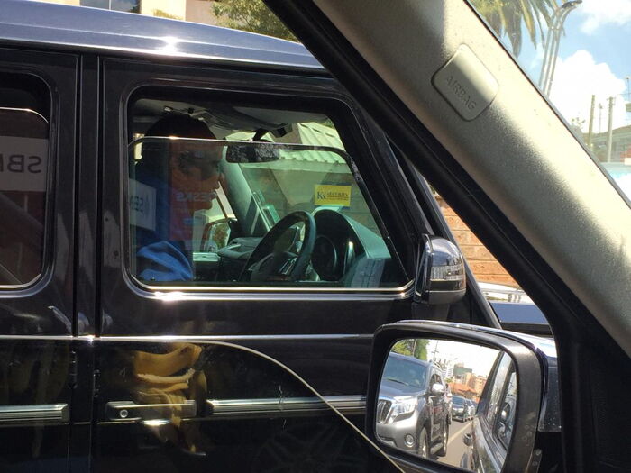President Uhuru Kenyatta driving a Mercedes Benz G-Wagon.