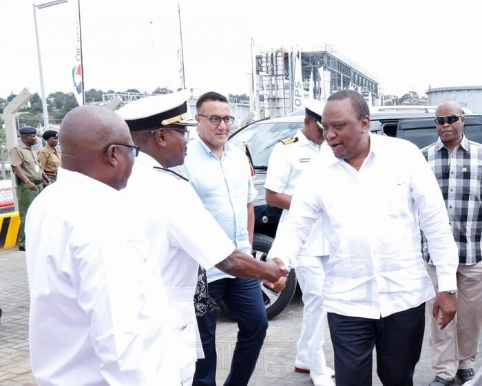 President Uhuru Kenyatta is introduced to a Seafarer captain at the Port of Mombasa on August 26, 2019.
