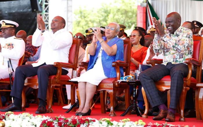 President Uhuru Kenyatta (L), First Lady Margaret Kenyatta (C) and Deputy President William Ruto pictured during the Mashujaa Day celebrations on October 20, 2019