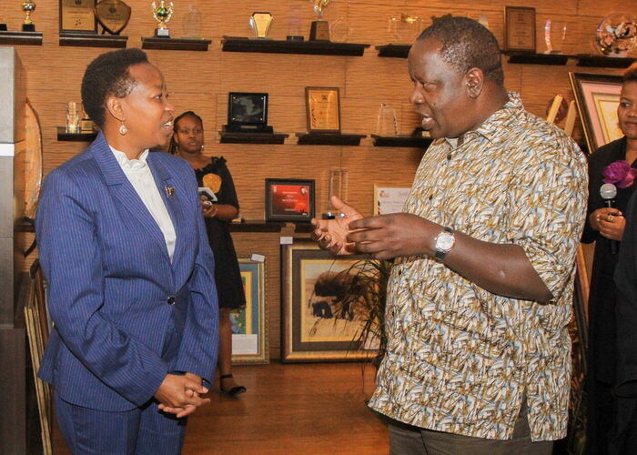 Mama Rachel ruto with Interior CS Dr. Fred Matiang'i during the Cross Stitches International exhibition at the Michael Joseph center on Tuesday, October 22. The CS pledged support for the project in a bid to empower inmates.
