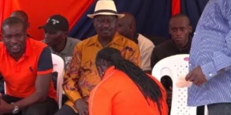 DJ Kriss Darlin kneeling before Raila Odinga on 25/8/2019. He is among the 11 ODM nominees for Kibra by-elections. 