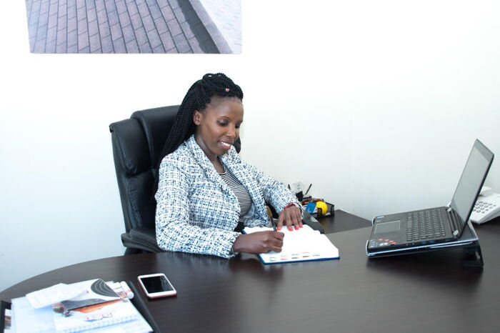 Rexe Roofing MD Irene Wanjiku at her office.
