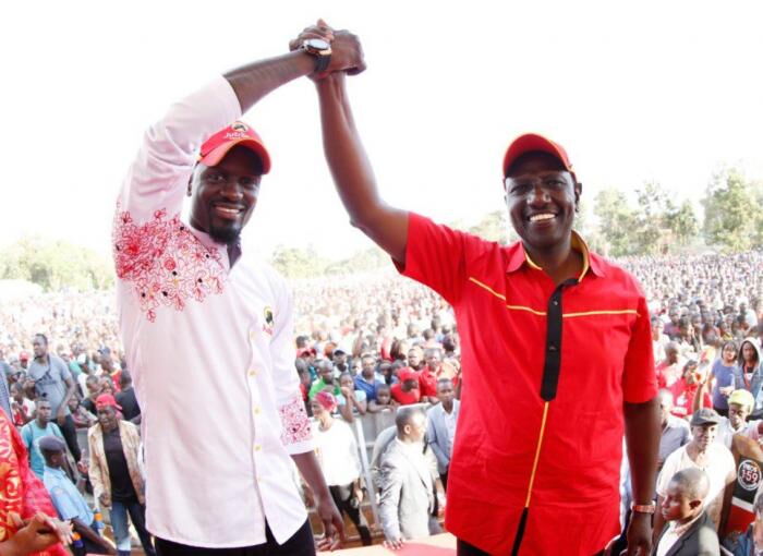 DP Ruto with McDonald Mariga at DC Grounds, Kibra, Nairobi County on November 3. Mariga lost to ODM's Imran Okoth 