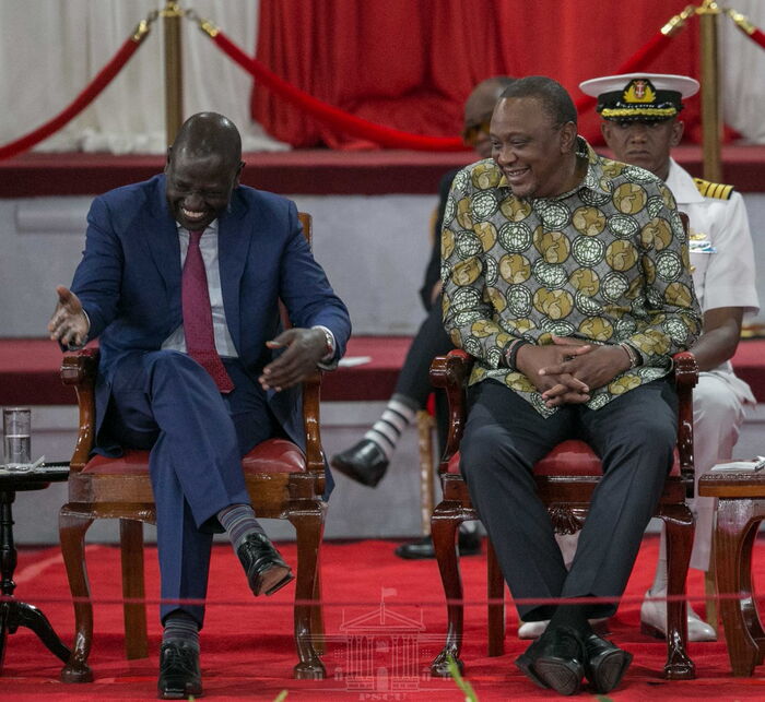 President Uhuru Kenyatta and Deputy President William Ruto share a light moment in Bomas