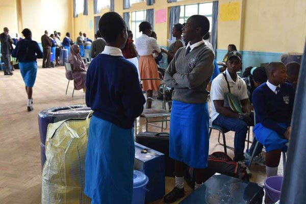Form One students report to Pangani Girls in Nairobi on January 9, 2018.