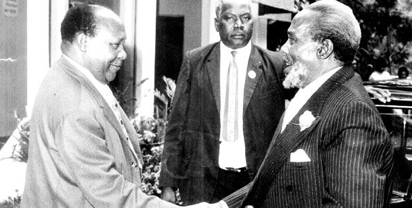 Mbiyu Koinange (l) with Mzee Jomo Kenyatta (r). The late Cabinet Minister's daughter won a court case on a contentious Nairobi land on Friday, October 18, 2019