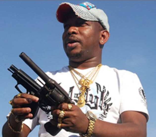 Image result for mike sonko with a gun
