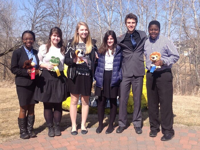 Derek Onserio(right) and his Providence Academy seniour high classmates.