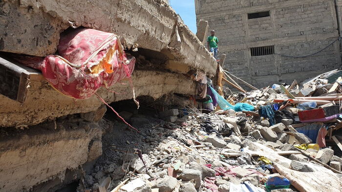 The strewn belongings of the occupants of the building that collapsed on Friday, December 6, in Tassia, Embakasi East 