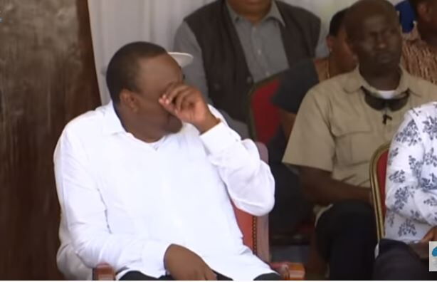President Uhuru Kenyatta laughing uncontrollably after a joke made by Mombasa Governor Ali Hassan Joho during the opening of the ASK show Joho