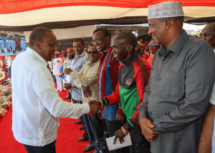 President Kenyatta meeting athletic legend Eliud Kipchoge and other dignitaries at the Mashujaa Day fete at the Mama Ngina Waterfront Park in Mombasa on October 20, 2019.