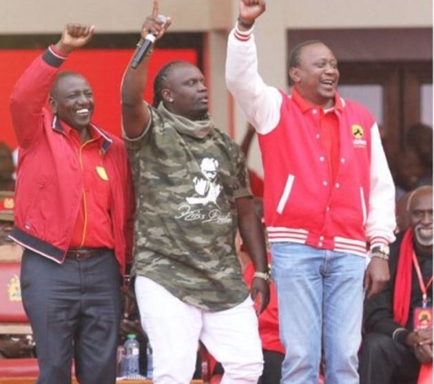 Kriss Darlin with Uhuru Kenyatta and DP William Ruto during the 2017 election campaigns.