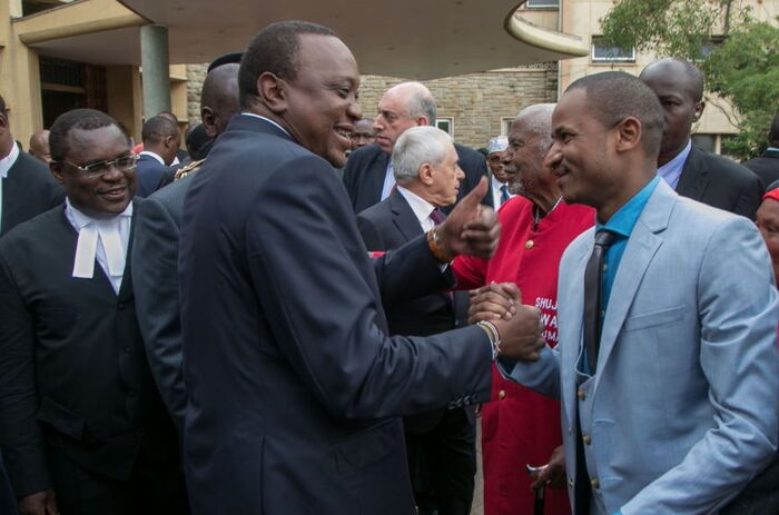 President Uhuru Kenyatta with Embakasi East MP Babu Owino. Babu accused Uhuru of betrayal