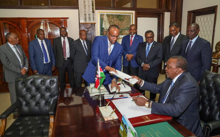 President Uhuru Kenyatta when he signed the National revenue redistribution bill. He on Thursday, November 7 signed into law a Finacial Act raising taxes.