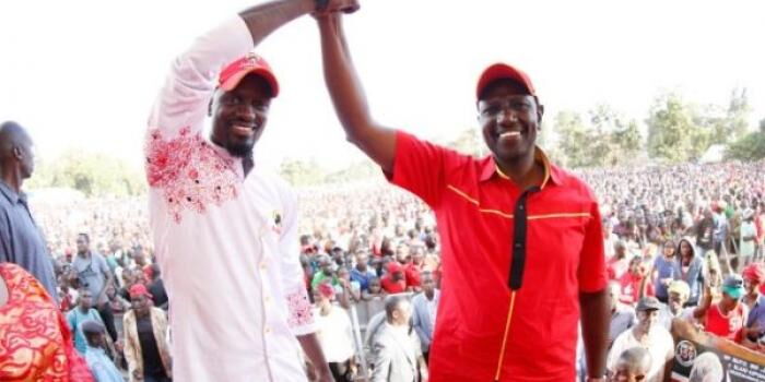 Deputy President William Ruto and Jubilee Kibra by-election candidate McDonald Mariga holding hands during their final campaigns at DC grounds in Kibra on Sunday, November 3.