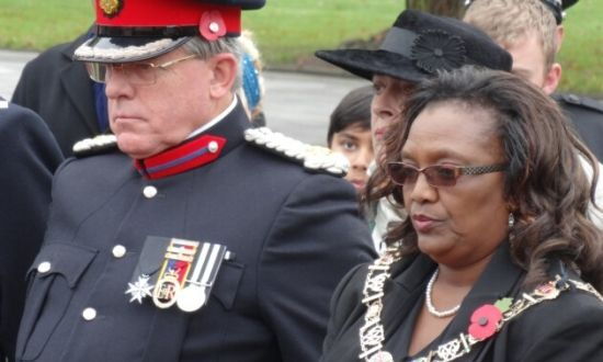  Major Anton O'Hagan and Cllr Elizabeth Kangethe during Remembrance Day at the war memorial, Barking Park.