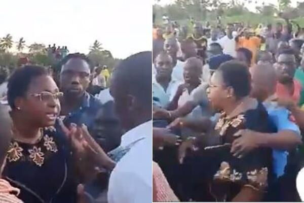 isha Jumwa being restrained by police during the altercation which led to the death of ODM's candidate uncle on Tuesday, October 15. She was released and ordered to present herself to DCI offices