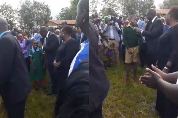 Deputy President William Rutointeracts with primary school student in Murang'a County on Thursday, February 13