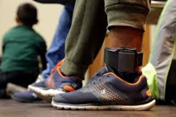 A man pictured wearing an ankle monitor on July 23, 2018.