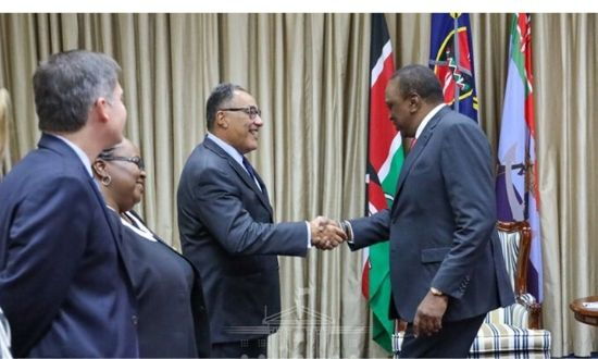 World Bank Vice President for Africa Hafez Ghanem exchanges greetings with President Uhuru Kenyatta after paying a courtesy call at State House, Nairobi in July 2019