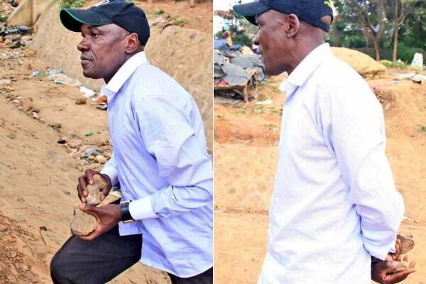 Former Kakamega Senator Boni Khalwale arms himself with stones after rowdy youth attacked him in Kibra on Thursday, November 7