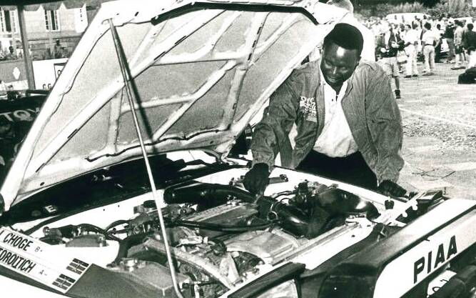 The late Jonathan Toroitich repairing his car. 